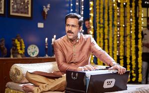 A still from Cheat India ft. Emraan Hashmi playing harmonium